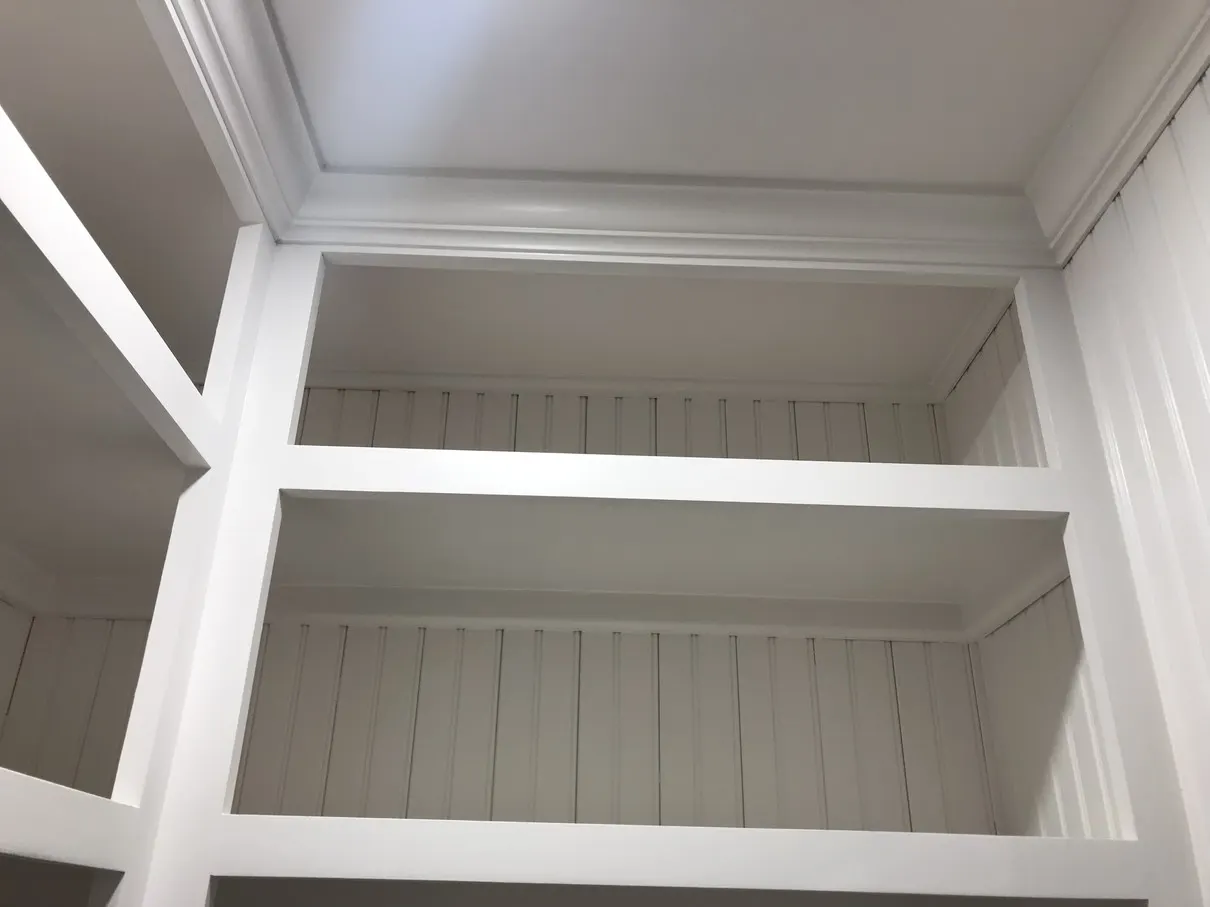 Custom built-in shelving system installed — Old Town Renovations, Long Island, NY